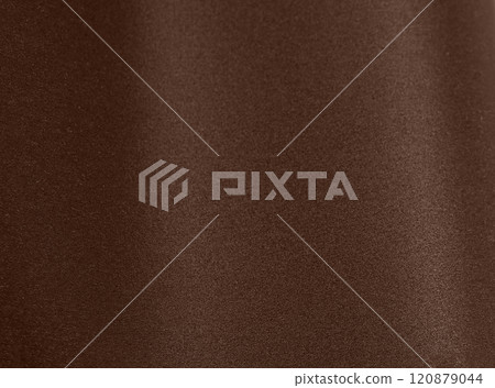 Mocha mousse tone on a trendy and modern paper backdrop 120879044