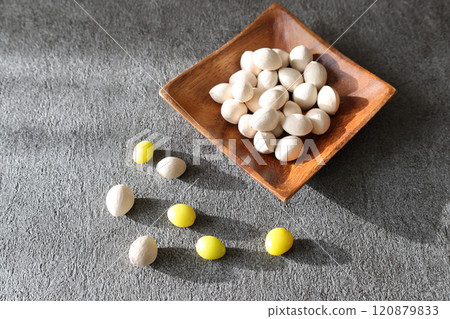 Ginkgo nuts on a grey background Ginkgo nuts on a grey background 120879833