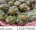 Fresh Green Artichokes in a Rustic Basket 120879946