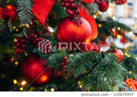 New Year's colorful trees in front of the Central Department Store in Moscow on Kuznetsky Most New Year's colorful trees in front of the Central Department Store in Moscow on Kuznetsky Most 120879947