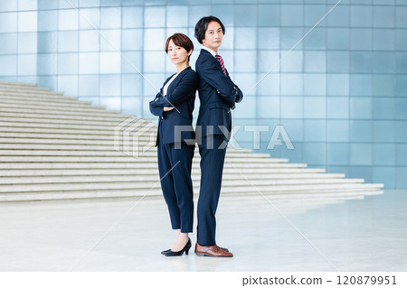 Male and female business people in suits Male and female business people in suits 120879951