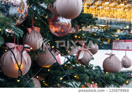 New Year's colorful trees in front of the Central Department Store in Moscow on Kuznetsky Most New Year's colorful trees in front of the Central Department Store in Moscow on Kuznetsky Most 120879968
