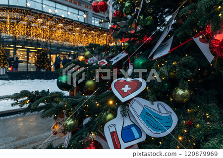 New Year's colorful trees in front of the Central Department Store in Moscow on Kuznetsky Most New Year's colorful trees in front of the Central Department Store in Moscow on Kuznetsky Most 120879969