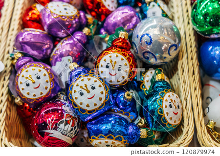 Christmas tree decorations on a store counter close-up 120879974