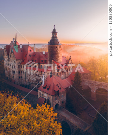 Choha Castle, a European castle shrouded in mist in the early autumn morning 120880009