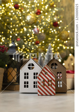 Paper houses and Christmas tree. Not AI 120880025