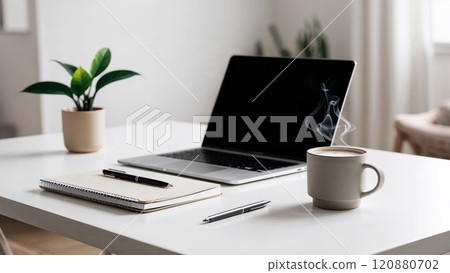 Minimalist workspace with laptop, notebook, and coffee cup 120880702