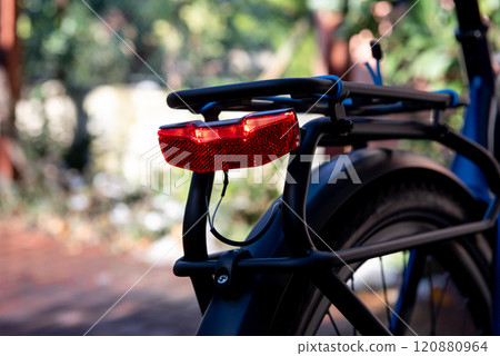 e-bike red bicycle tail light close-up.Electric Bike e-bike red bicycle tail light close-up.Electric Bike 120880964