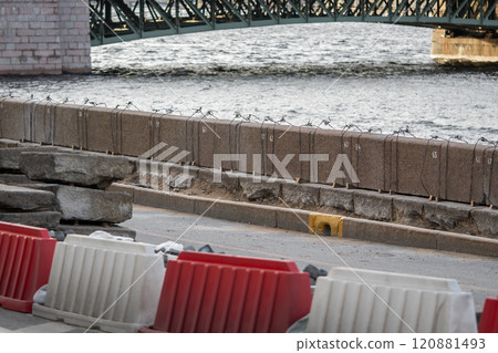 Neva river embankment maintenance. Reinforcing structure to prevent flooding under municipal care Neva river embankment maintenance. Reinforcing structure to prevent flooding under municipal care 120881493
