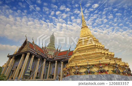 Yaksha Demon Statues holding the golden chedi in the Temple of the Emerald Buddha, Grand Palace, Bangkok, Thailand Yaksha Demon Statues holding the golden chedi in the Temple of the Emerald Buddha, Grand Palace, Bangkok, Thailand 120883357