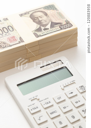 4 million yen and calculator on white background 4 million yen and calculator on white background 120883938