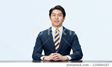 Male announcer reading the news Male announcer reading the news 120884287