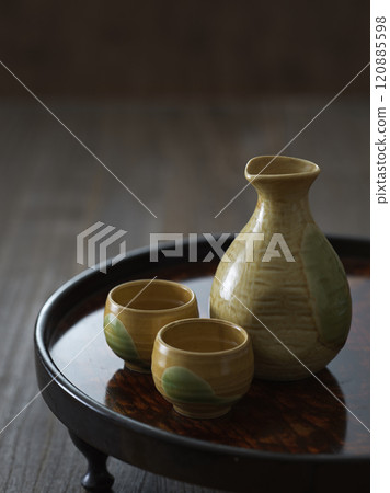 Drinking image: Sake cup and tokkuri sake set Drinking image: Sake cup and tokkuri sake set 120885598