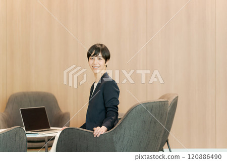 Woman working in coworking space 120886490
