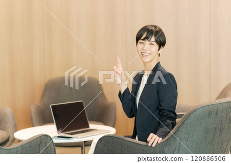 Woman working in coworking space 120886506