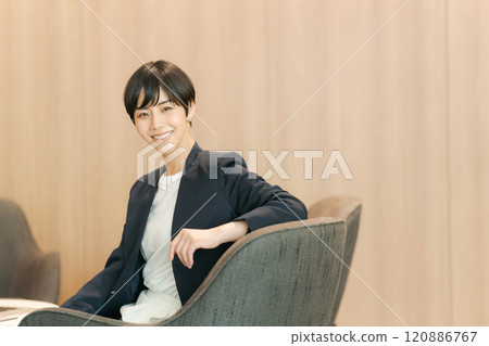 Woman working in coworking space Woman working in coworking space 120886767