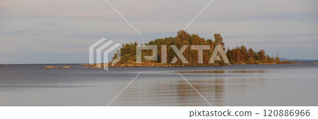 Small island covered by forest in Lake Vanern. Vita Sannar, Sweden. 120886966