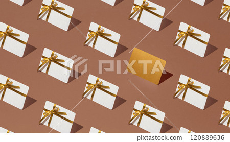Isometric pattern of credit cards, gift cards, bonus cards. consumer concept, on a mocha colors background. Gifts for Christmas Isometric pattern of credit cards, gift cards, bonus cards. consumer concept, on a mocha colors background. Gifts for Christmas 120889636