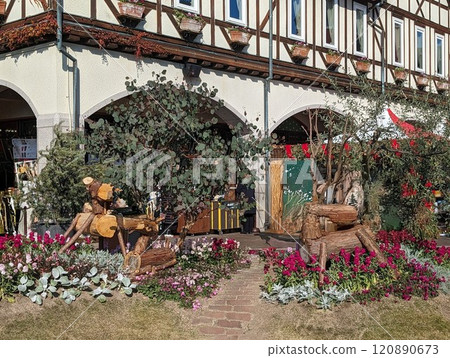 Landscape with flowers and a wooden horse 120890673