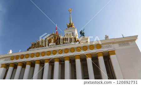 VDNH in Moscow. Building with columns with gold decoration 120892731