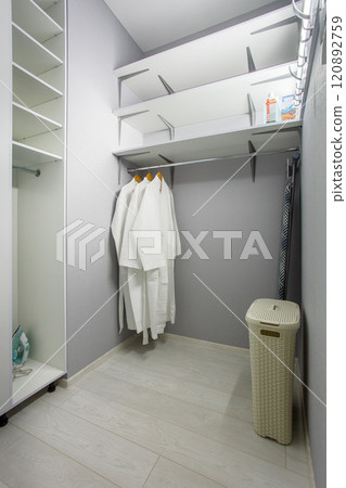 Modern gray scandinavian loft wood walk in closet with wardrobe Modern gray scandinavian loft wood walk in closet with wardrobe 120892759