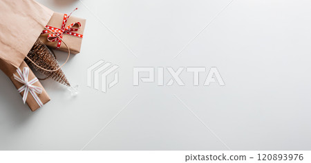 Christmas background with gift bags. Christmas sale and shopping concept Christmas background with gift bags. Christmas sale and shopping concept 120893976