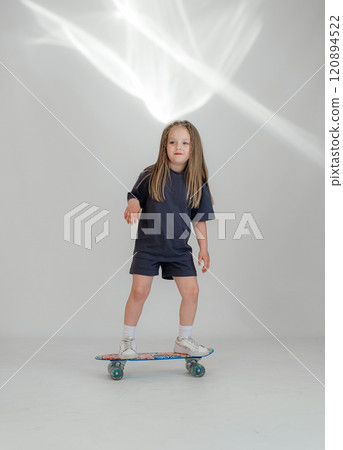Funny girl 5 years posing at studio. Girl have fun on white background Funny girl 5 years posing at studio. Girl have fun on white background 120894522