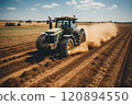 The tractor cultivates the soil and grinds the dry grass at the same time, the grass as fertilizer for the soil. 120894550