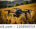 The drone is flying in the field. 120894554