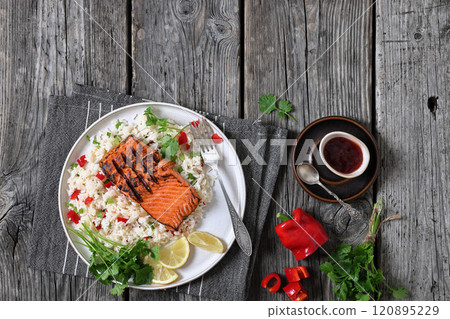 grilled red salmon fillet with rice, top view grilled red salmon fillet with rice, top view 120895229