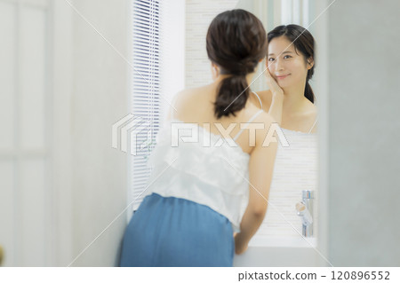 Young woman in the bathroom, beauty image 120896552