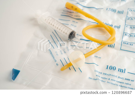 Foley catheter and urine drainage bag collect urine for disability or patient in hospital. Foley catheter and urine drainage bag collect urine for disability or patient in hospital. 120896687