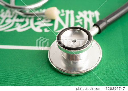 Saudi Arabia flag with black stethoscope, Business and finance concept. 120896747