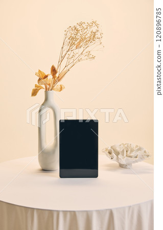 Smartphone positioned vertically in clean minimalist setting, ideal mockup for showcasing apps, promotions, or sleek product presentations. Smartphone positioned vertically in clean minimalist setting, ideal mockup for showcasing apps, promotions, or sleek product presentations. 120896785