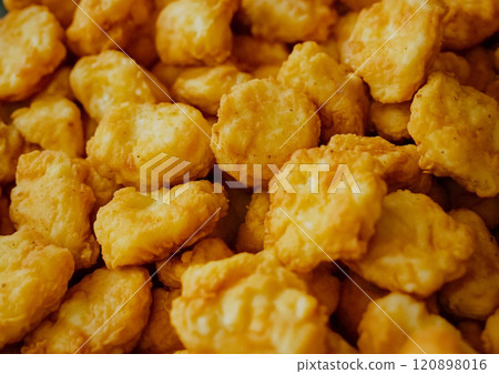 Top view of fried chicken fillet breaded nuggets fast food snack.Macro.AI Generative. 120898016