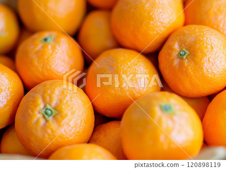 Fresh raw ripe sweet tangerines mandarins citrus fruits.Top view.AI Generative. Fresh raw ripe sweet tangerines mandarins citrus fruits.Top view.AI Generative. 120898119