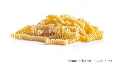 Uncooked italian pasta. Fusilli pasta isolated on white background. Uncooked italian pasta. Fusilli pasta isolated on white background. 120898963