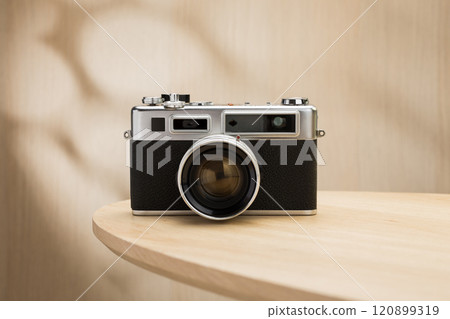 A classic rangefinder film camera. A classic rangefinder film camera. 120899319