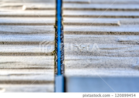 Deteriorated sealant and siding 120899454