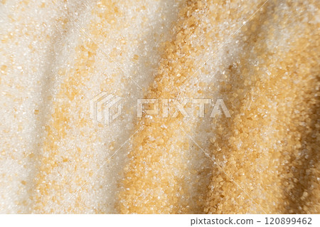 Two types of crystalline sugar are white refined beet sugar and brown unrefined cane sugar. Two types of crystalline sugar are white refined beet sugar and brown unrefined cane sugar. 120899462