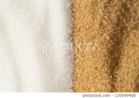 Two types of crystalline sugar are white refined beet sugar and brown unrefined cane sugar. Two types of crystalline sugar are white refined beet sugar and brown unrefined cane sugar. 120899480