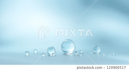 Blue background with transparent glass balls. 120900517