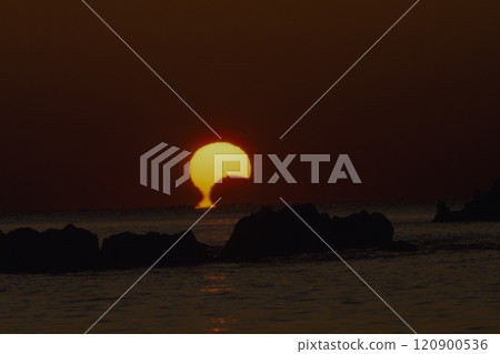 Sunrise of a solar eclipse Sunrise of a solar eclipse 120900536