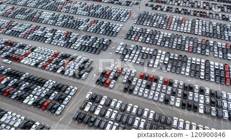 Aerial view new car lined up in the port for dealership business import and export, New car lined up parking lot outside an automobile automotive factory distribution for sale. 120900846