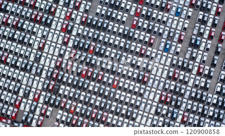 Aerial view new car lined up in the port for dealership business import and export, New car lined up parking lot outside an automobile automotive factory distribution for sale. 120900858