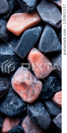 Polished opal pebble background. Smooth round colorful gravel stone texture 120901317