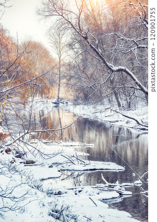 Outstanding landscape in city park with snowy trees and beautiful reflection in frozen river. Outstanding landscape in city park with snowy trees and beautiful reflection in frozen river. 120901755