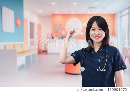 Young woman working in a pediatric clinic 120901973