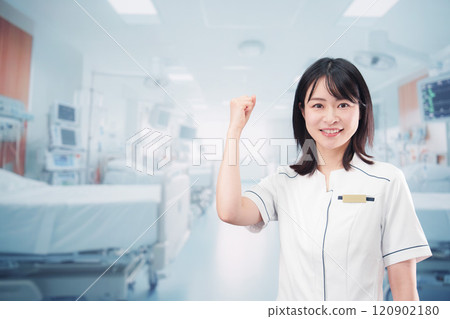 Young female nurse working in the ward 120902180
