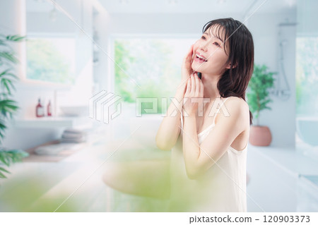 Young woman doing skin care at home Young woman doing skin care at home 120903373